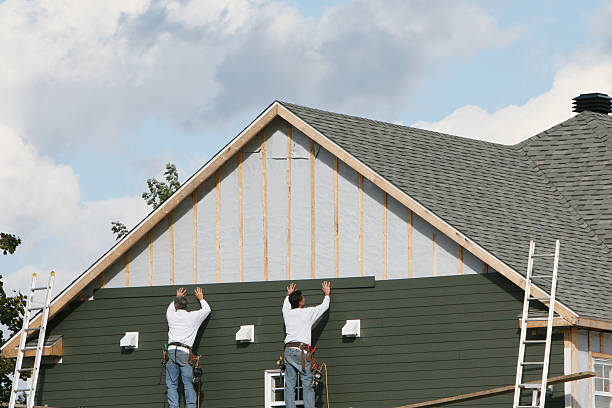 Professional Siding Installation technician working in Baldwin, MD